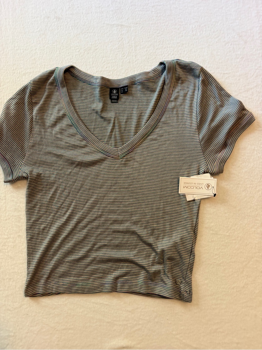 Volcom Women’s V-Neck Tee in multi colored strips
